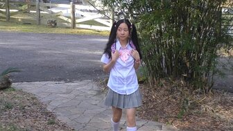 Cute school girl with double ponytails was punished by teacher