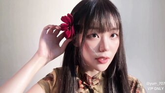 Beautiful slut in Cheongsam and black stockings fingered